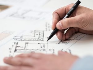 Hand drawing out business plan sketches
