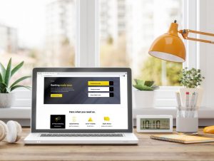 Laptop on desk with banking website