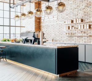 Coffee shop countertop with hanging pendant lights