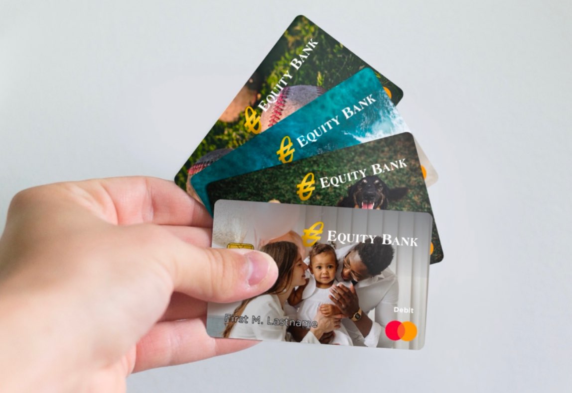 Close-up of four personalized debit cards