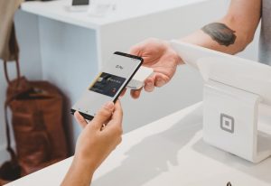 person using Equity card with Google Pay