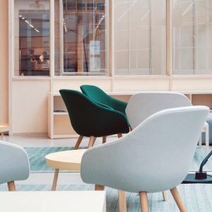 interior of a living room with chairs and a table