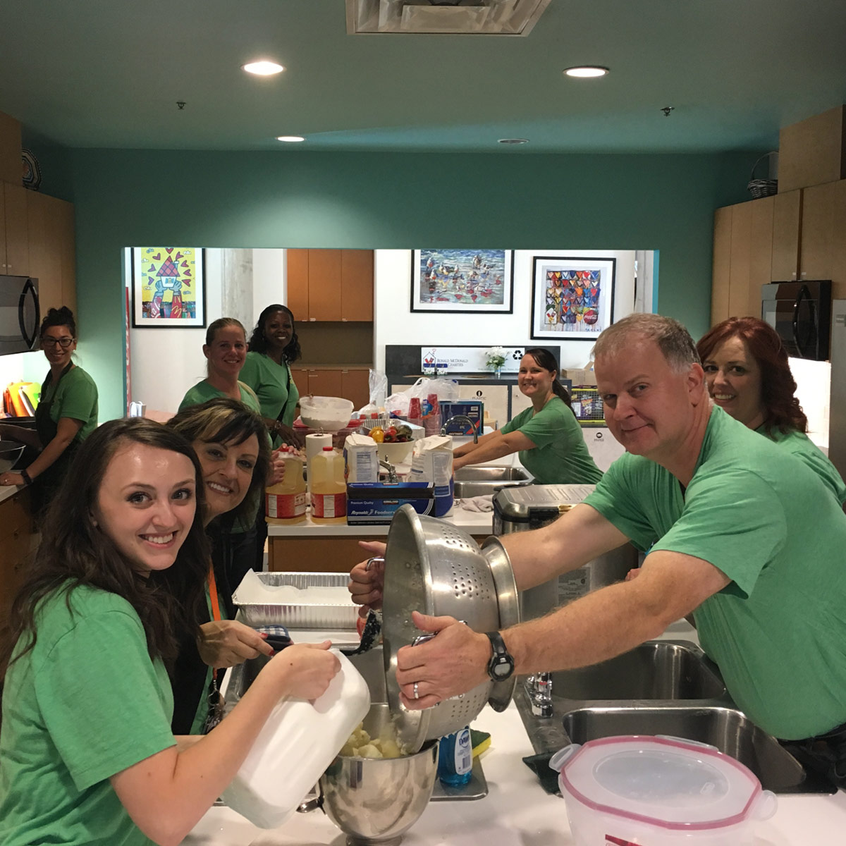 Volunteers cooking.