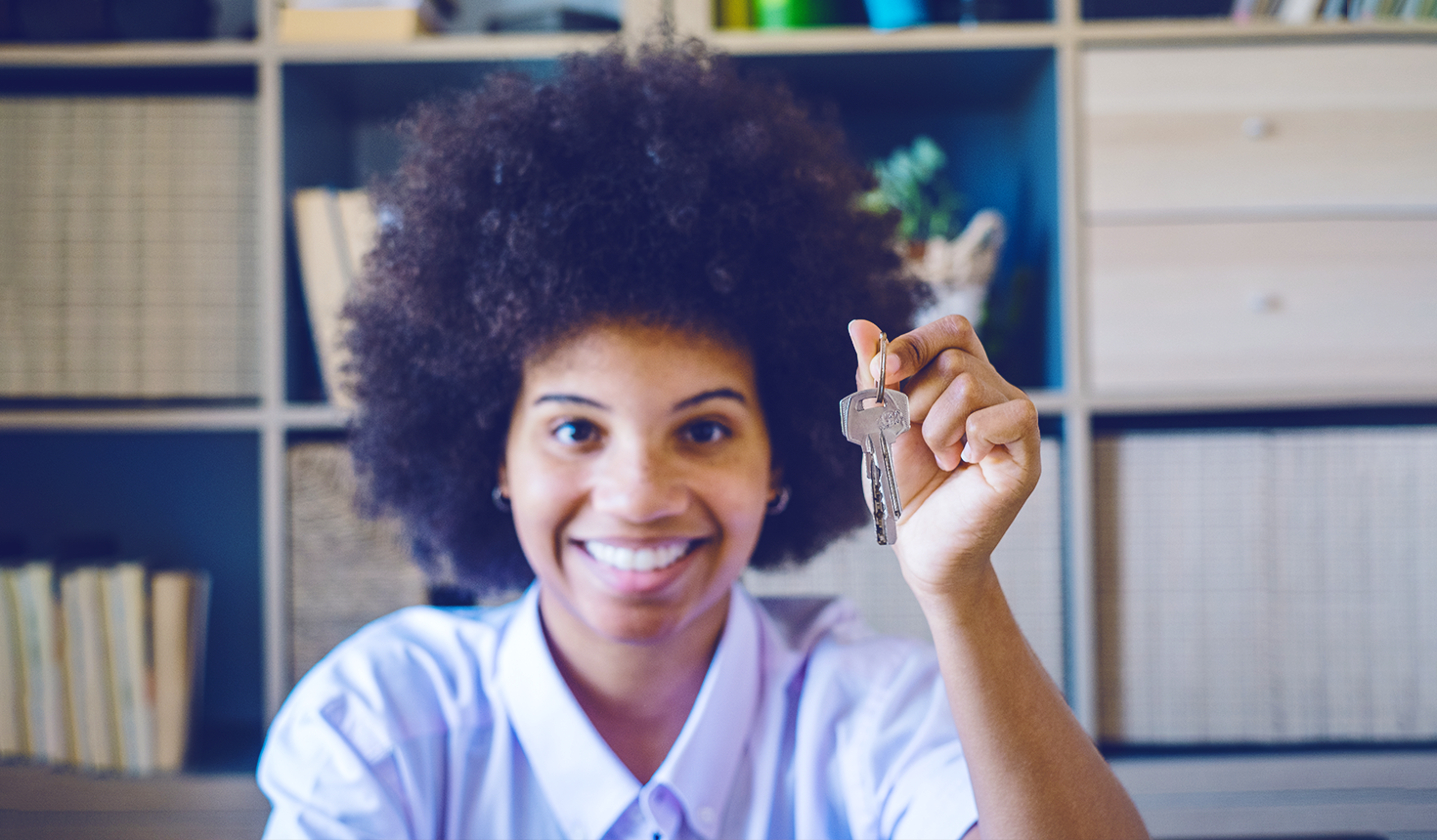 Man Holding House Key
