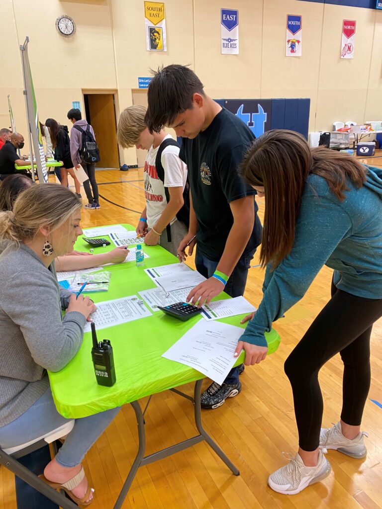 Kids signing Papers