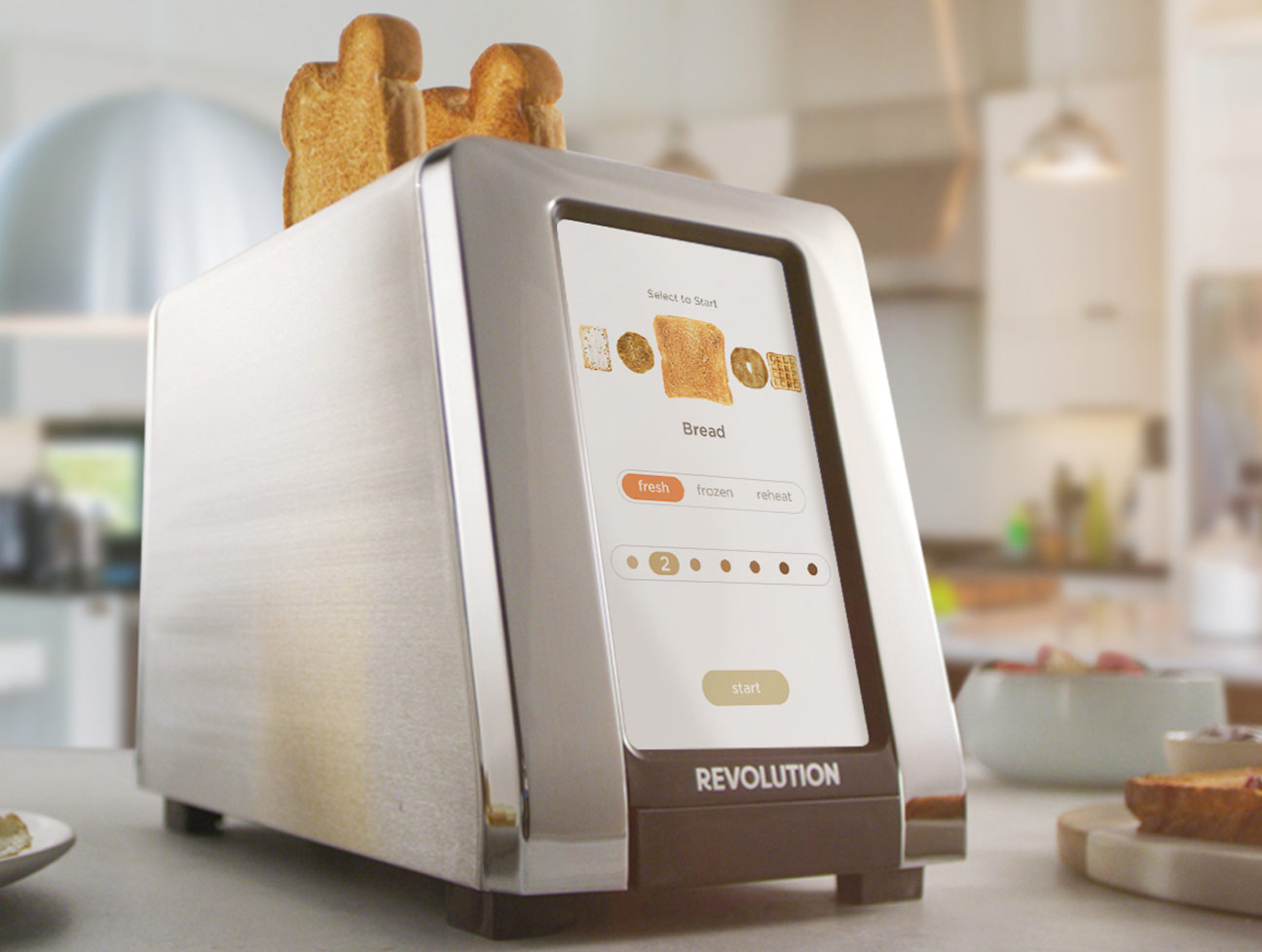 Revolution Toaster sitting on counter, showing touch screen controls.