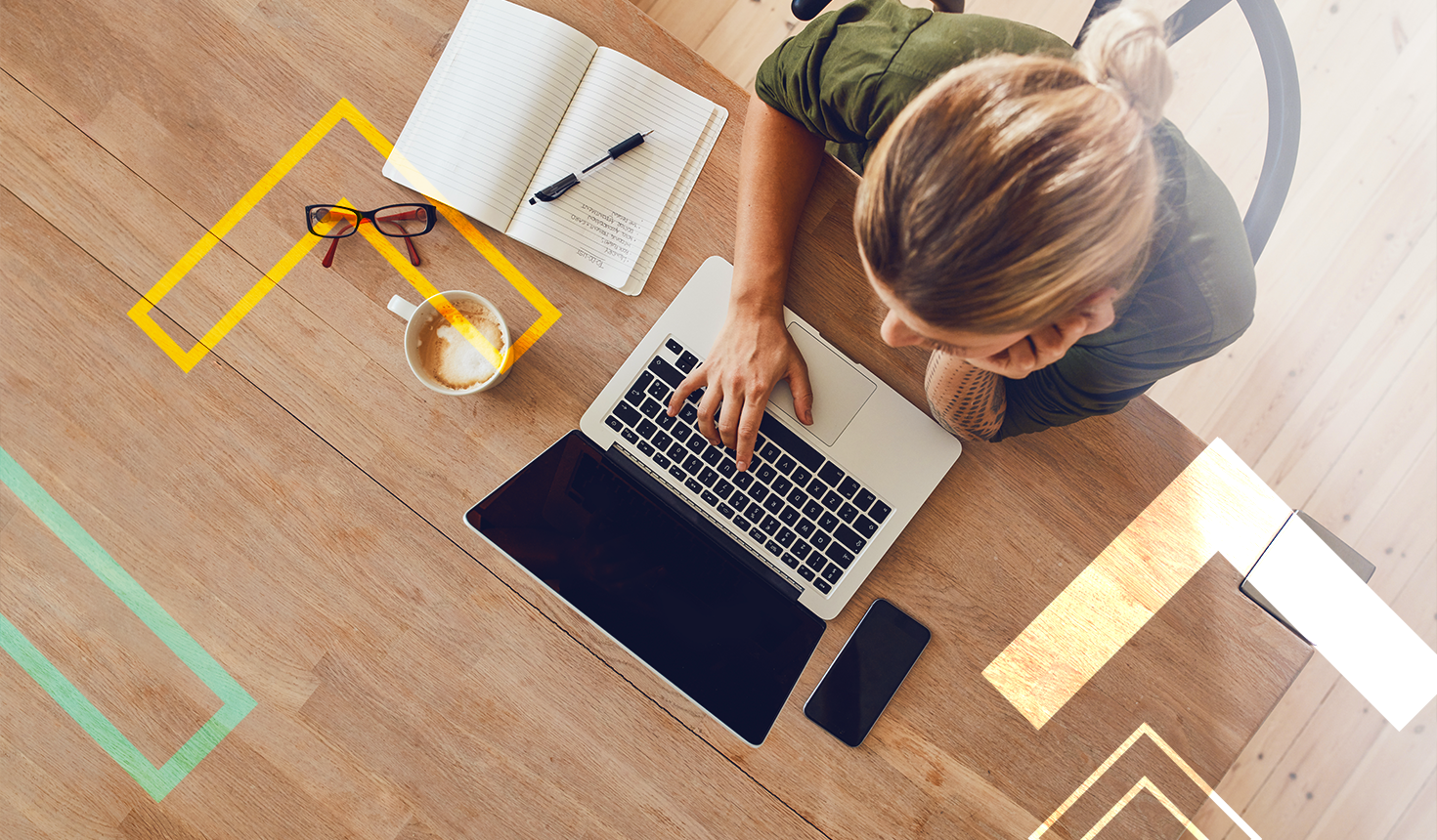 Girl sitting down at a computer, figuring out finances