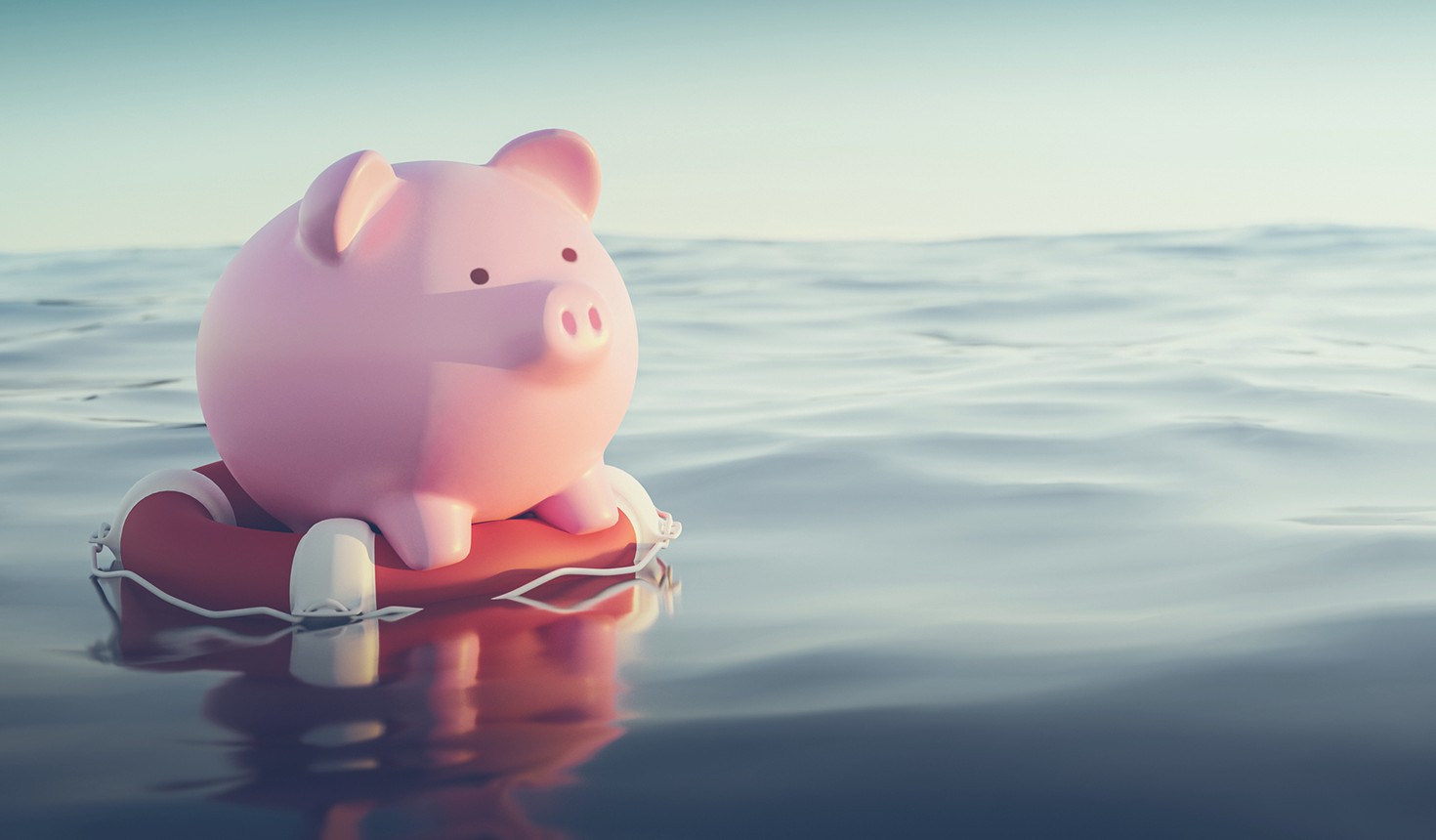 Piggy Bank Floating in Ocean