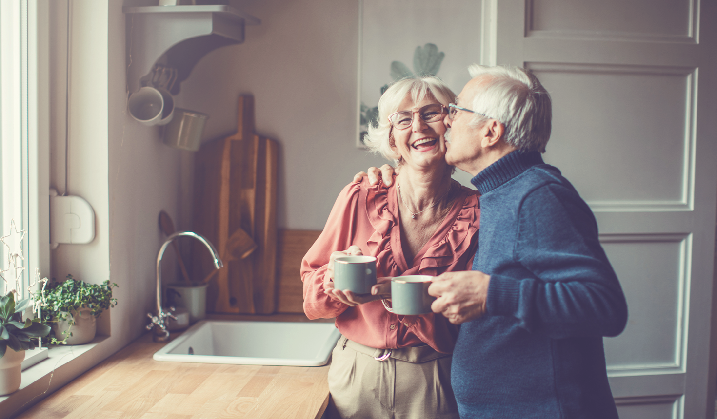 Elderly Couple Kissing